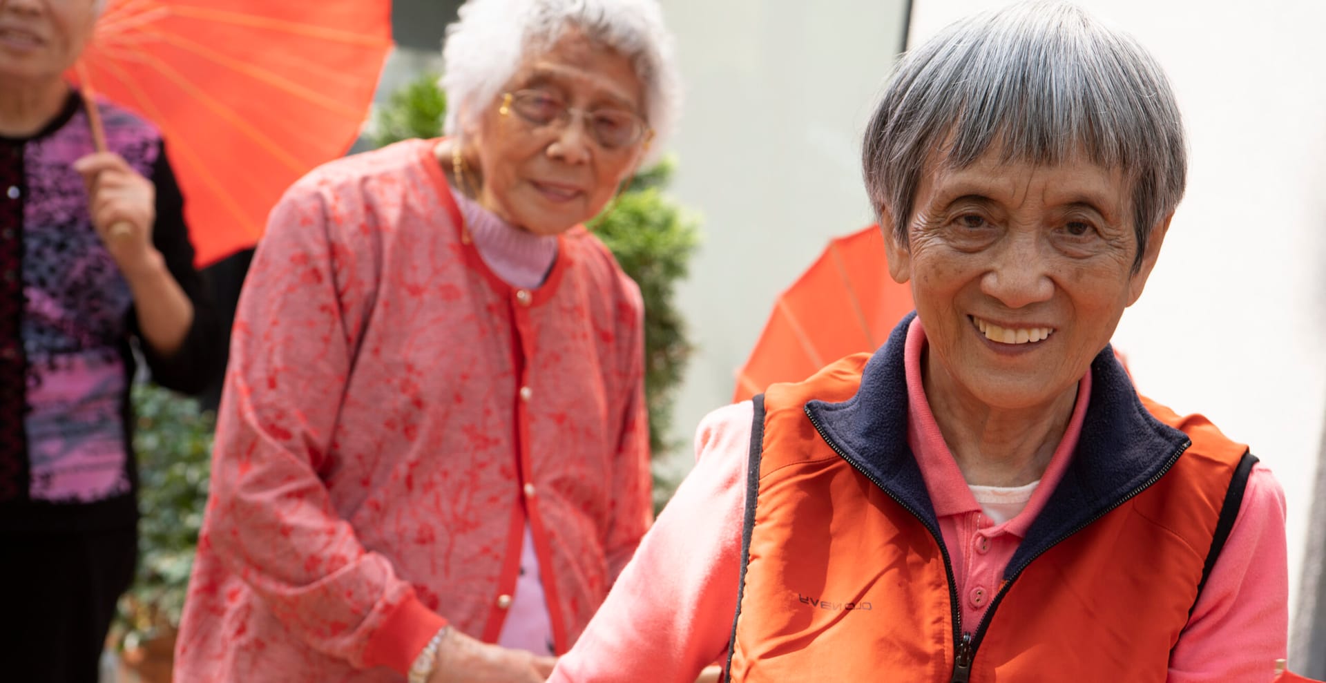 CASL older adult dancers with umbrellas.